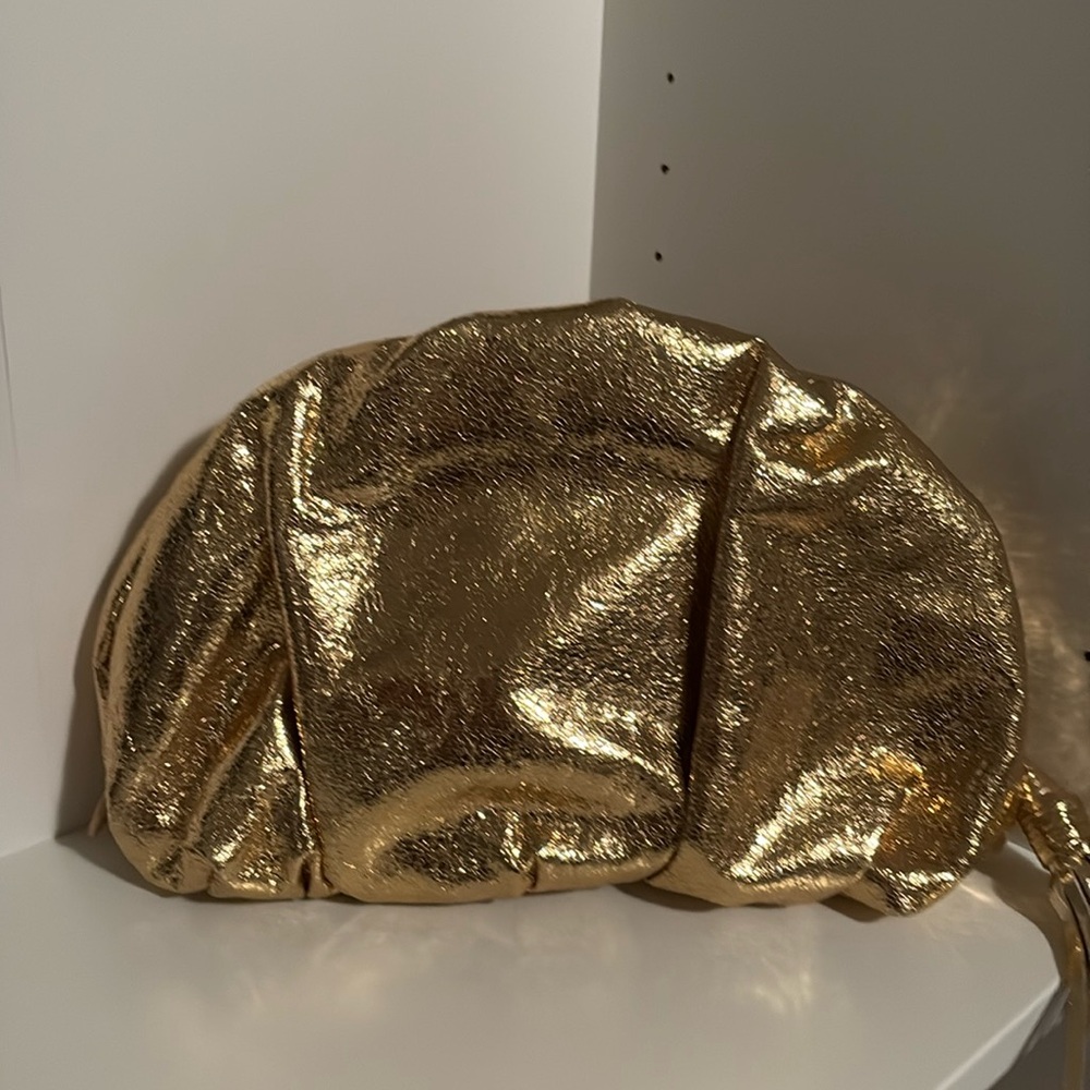 Gold Rebecca minkoff clutch with tassel